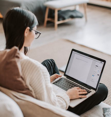 writing on a laptop